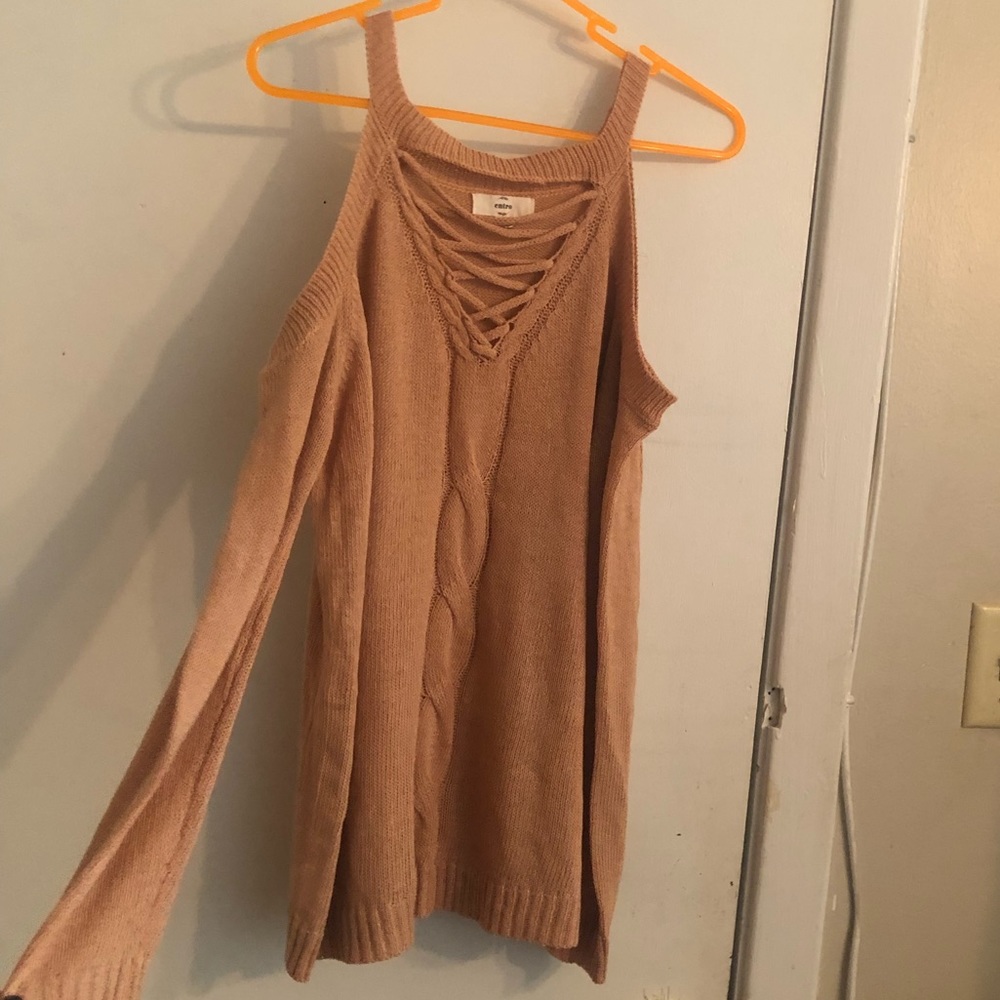 An Entro, size M, light shade of pink, open shoulder, long sleeve, knit sweater.